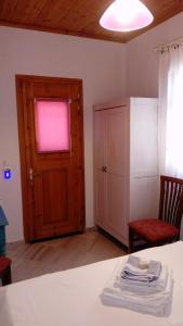 Фотография из галереи ZACHAROULA ROOMS 2 в городе Manganítis