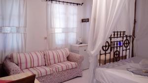 Кровать или кровати в номере ZACHAROULA ROOMS 2