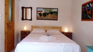 Кровать или кровати в номере ZACHAROULA ROOMS 2