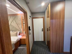 a small room with a bed and a door at istanbul vipinnhotels in Istanbul +75 photos