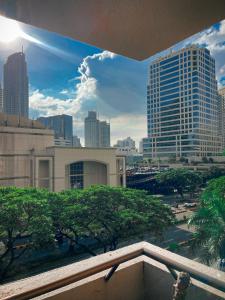 a view of a city skyline with tall buildings at Spacious Luxury 3BR at the Heart of Makati in Manila