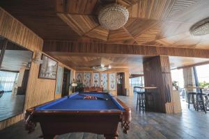 a pool table in a room with a ceiling at Bay Lodge Boutique Hotel in Jounieh