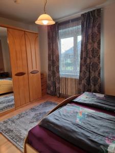 Posteľ alebo postele v izbe v ubytovaní Ferienhaus Burgblick