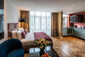 Kuchyň nebo kuchyňský kout v ubytování Jupiter Hotel