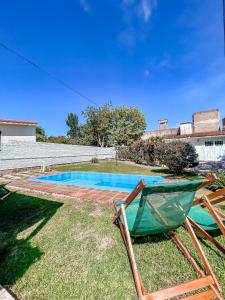 Bazén v ubytování Hermosa casa con Pileta nebo v jeho okolí