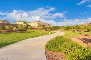 a walkway through a residential neighborhood with houses at *Home away from home* 5 min away from Stadium in Phoenix