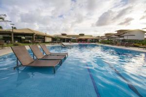 Bazén v ubytování Ykutiba Imbassai H101 - apt vista rio e mar nebo v jeho okolí