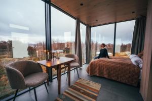 Postel nebo postele na pokoji v ubytování WonderInn Arctic