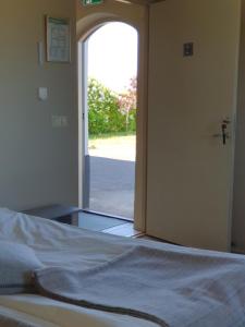 Katil atau katil-katil dalam bilik di Bed & Breakfast Vinkille