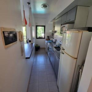 Kuchyň nebo kuchyňský kout v ubytování MONROE SUITES con cochera