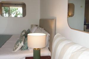 Ein Bett oder Betten in einem Zimmer der Unterkunft VUE MER Site paradisiaque Superbe décoration