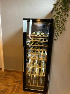 a refrigerator filled with lots of donuts in a room at Wellness Tajemství Lucy 