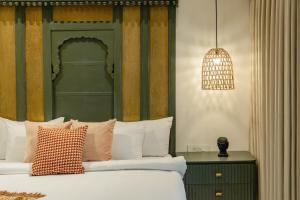 Surpura Bagh - A Luxury Boutique Resort客房内的一张或多张床位