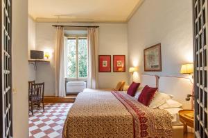 Postel nebo postele na pokoji v ubytování Hotel Bonifacio