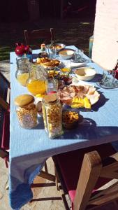 a blue table with food on it at La Colorada, home for... La Amistad Polo in Open Door