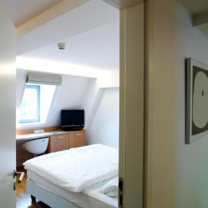 Μια τηλεόραση ή/και κέντρο ψυχαγωγίας στο Hotel Simoncini