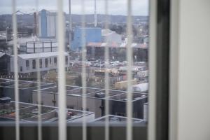 a view of a city from a window at GuestReady - City Centre Apartment, Sleep 4 in Hunslet