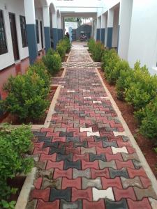 a walkway in the middle of a building at Dream Guest House in Trincomalee