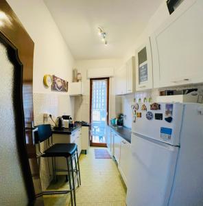 Kuchyň nebo kuchyňský kout v ubytování Penthouse Salus vista mare Ostia