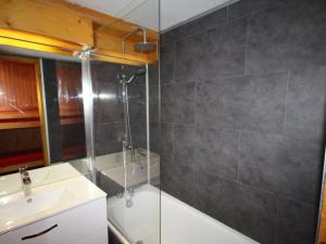 a bathroom with a shower and a sink at Studio Les Saisies, 1 pièce, 4 personnes - FR-1-293-167 in Les Saisies