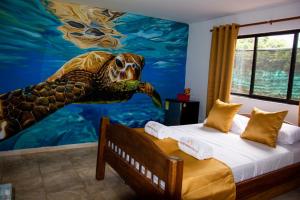 Postel nebo postele na pokoji v ubytování Hotel San Sebastian del Tonusco