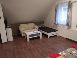Łóżko lub łóżka w pokoju w obiekcie Apartmán Frank