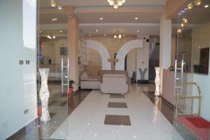 a church lobby with a cross on the wall at Ye Afoli International Hotel in Addis Ababa