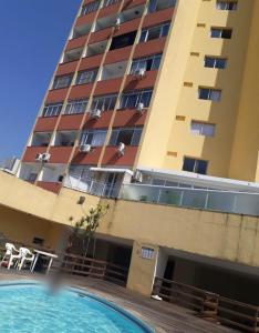 Swimmingpoolen hos eller tæt på kitnet Guarujá pitangueiras boulevard