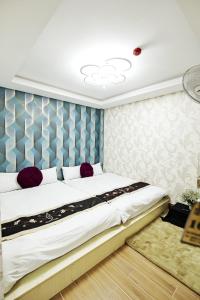 Postel nebo postele na pokoji v ubytování Sunshine - Tia Nắng Mới