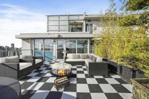 an outdoor patio with a checkered floor at Skyline Hideaway in Vancouver