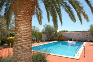 Bazén v ubytovaní Holiday Home Villa Margherita alebo v jeho blízkosti