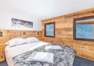 Postel nebo postele na pokoji v ubytování Val Thorens So Cocooon Silveralp 330