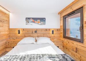 Postel nebo postele na pokoji v ubytování Val Thorens So Cocooon Silveralp 330