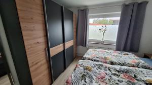 Postel nebo postele na pokoji v ubytování Ferienwohnung Feldblick