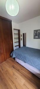 Katil atau katil-katil dalam bilik di En el mejor barrio de Reñaca