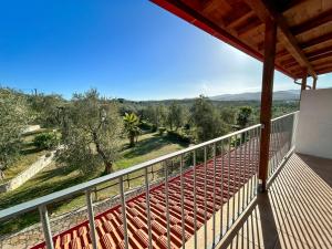 Balkón nebo terasa v ubytování Valle degli Ulivi B&B