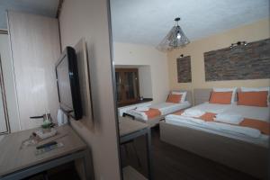 מיטה או מיטות בחדר ב-Villa La Munte