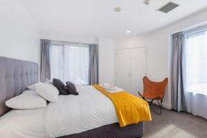מיטה או מיטות בחדר ב-City Slicker