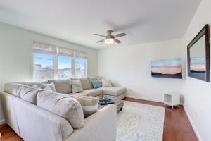 a living room with a couch and a ceiling fan at Mystic Island Bay Breeze in Little Egg Harbor Township