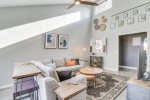 a living room with a couch and a tv at Harrisonburg Home with Deck - 2 Mi to JMU! in Harrisonburg