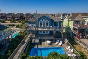 an aerial view of a house with a swimming pool at DE25N Tequila Sunrise in Nags Head