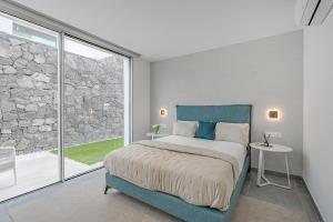 Postel nebo postele na pokoji v ubytování Villa Estándar 5 - Casangular by Upper + 43 fotografií