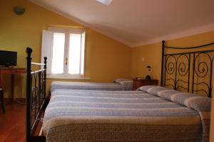 Кровать или кровати в номере B&B Al Borgo