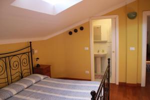 Кровать или кровати в номере B&B Al Borgo