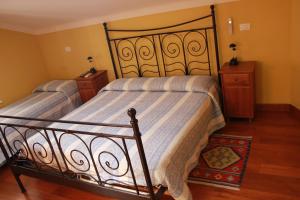 Кровать или кровати в номере B&B Al Borgo