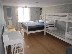 Postel nebo postele na pokoji v ubytování Björksebo