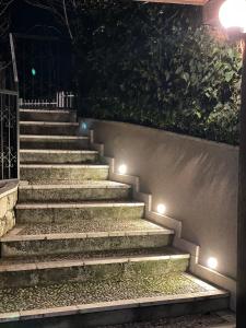 a set of stairs at night with lights at Sarajevo View - Fresh air in Sarajevo