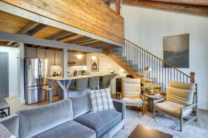 a living room with a couch and a bar at Mountain-View Condo in Brian Head with Private Sauna in Brian Head
