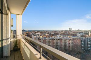 a balcony with a view of a city at Tendency Apartments 3 in Barcelona
