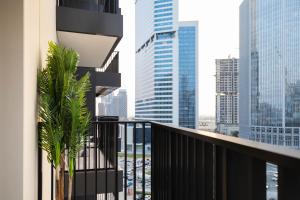 a balcony with a view of the city at Trophy - Ahad Residence Business Bay Suite in Dubai